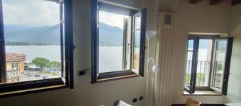 Two-room apartment in the historic center, wonderful view of lake and mountains.