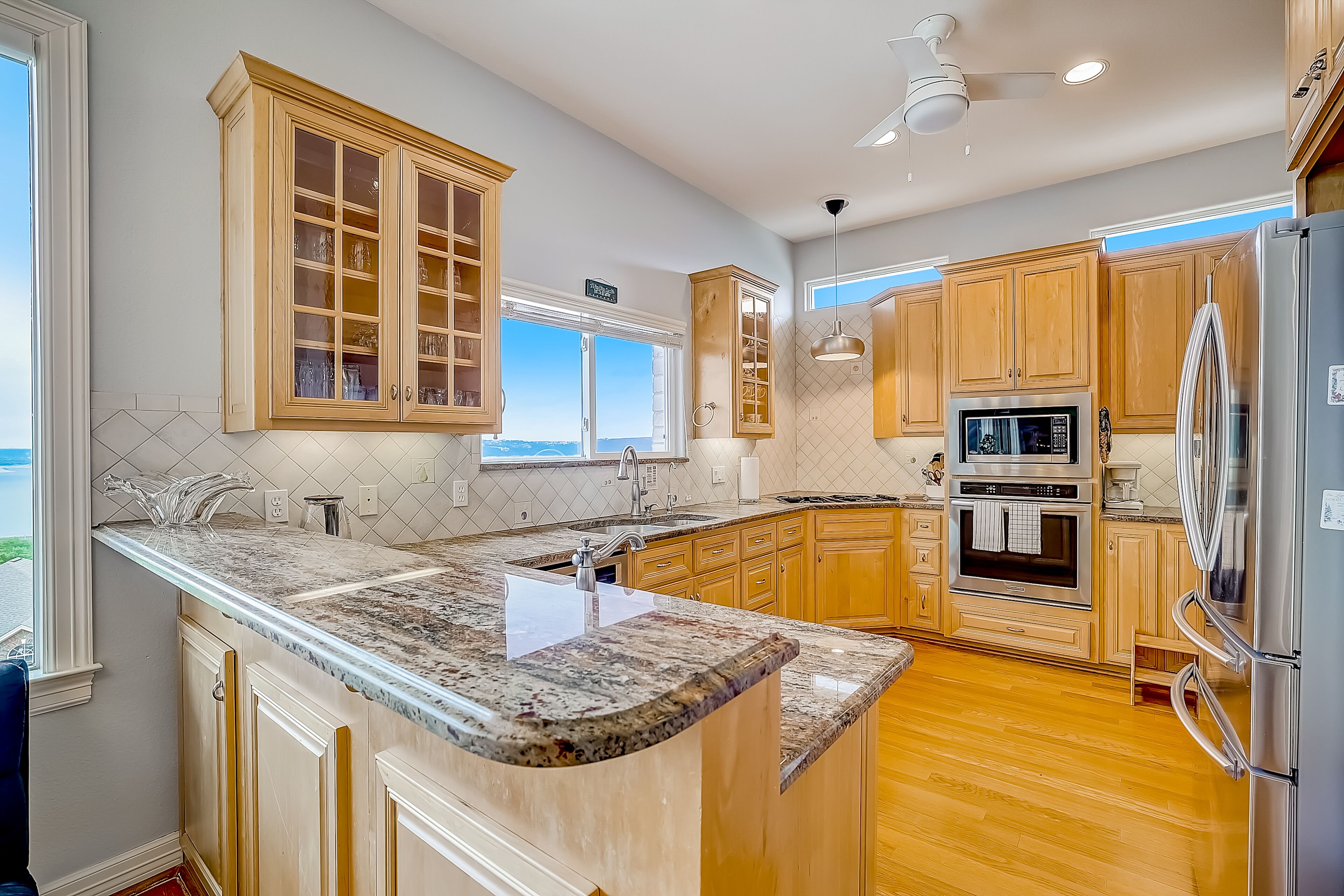 Sprawling private home with a large yard, water views, in-home gym, W/D, & AC