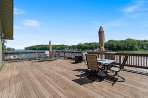 Outdoor dining - Unique lake house built overwater on the Great Lakes, Sodus Bay Lake Ontario (Wolcott)