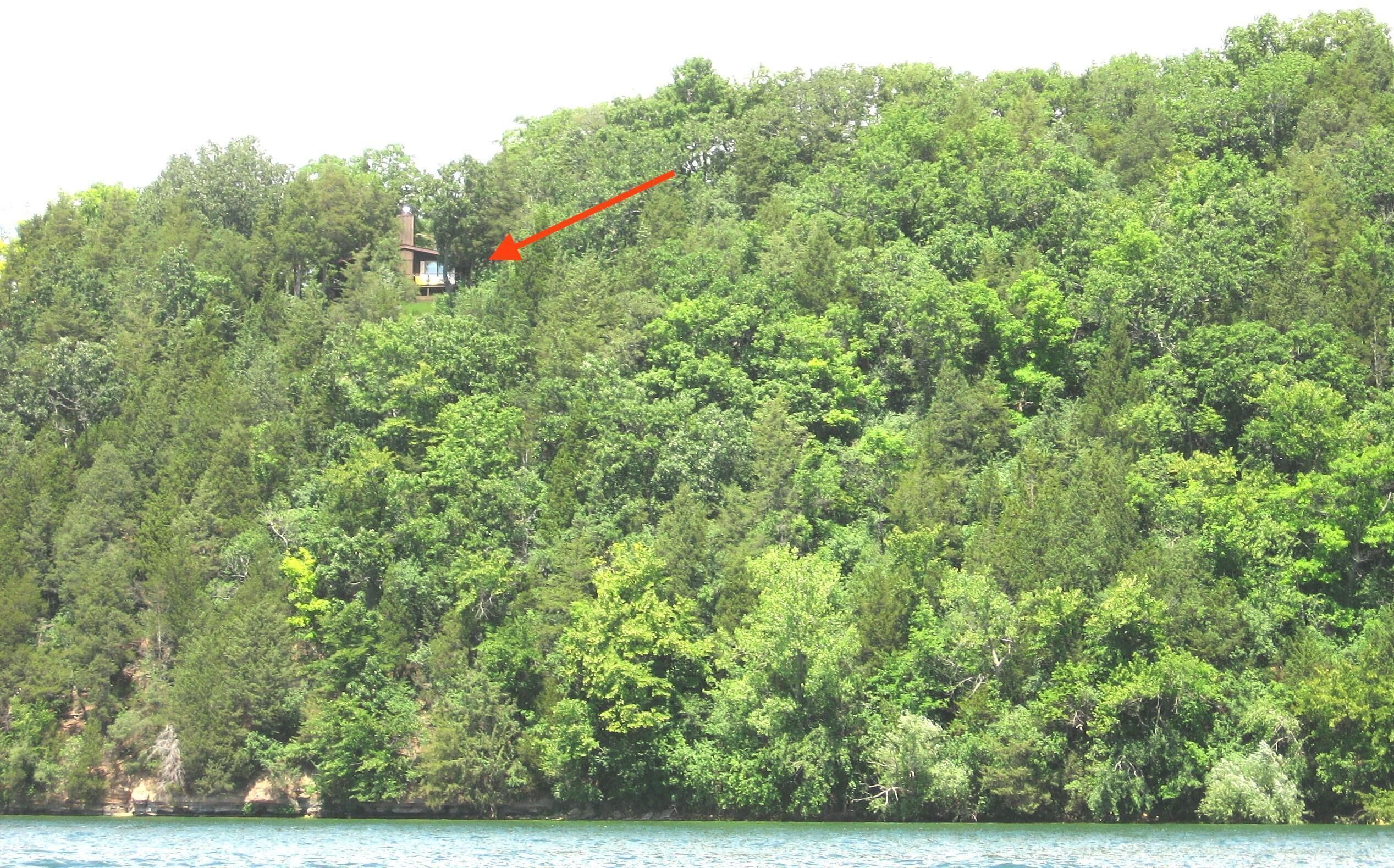 Woodsy Lakefront Retreat high above Green Lake