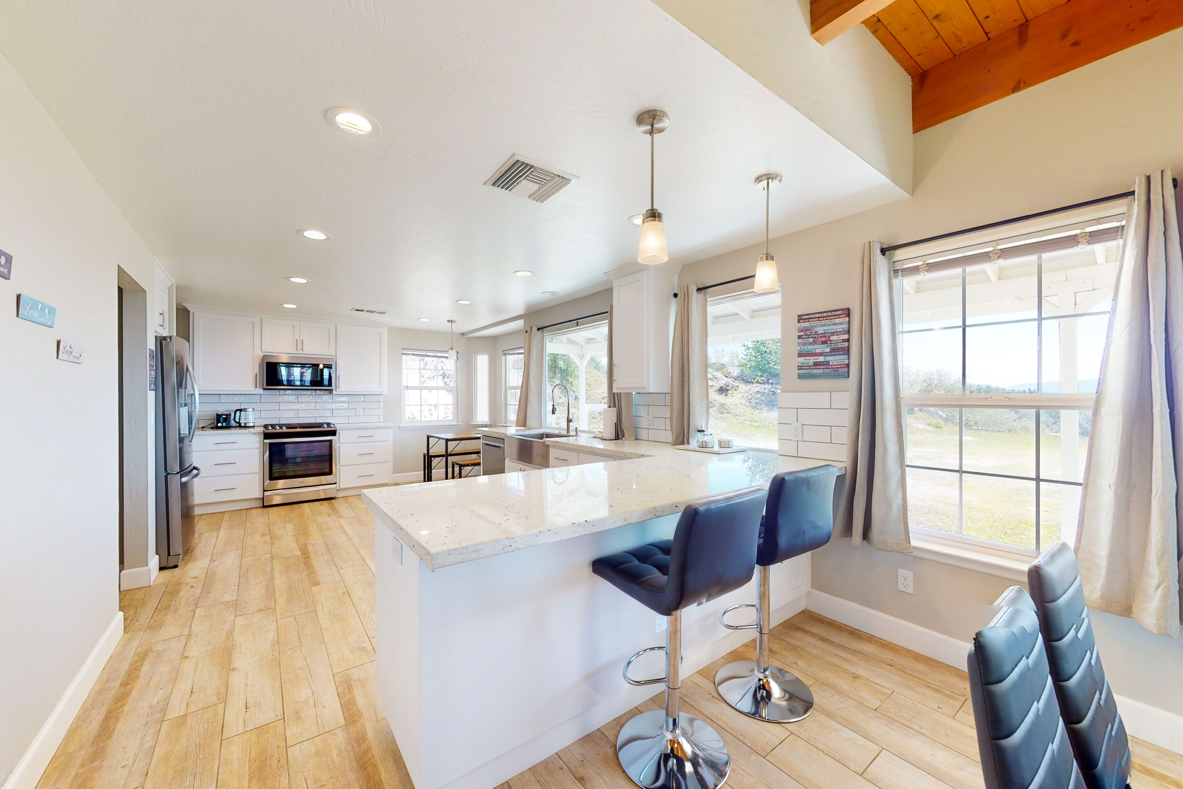 Updated mountain-view home with covered porch, central AC, & electric fireplace