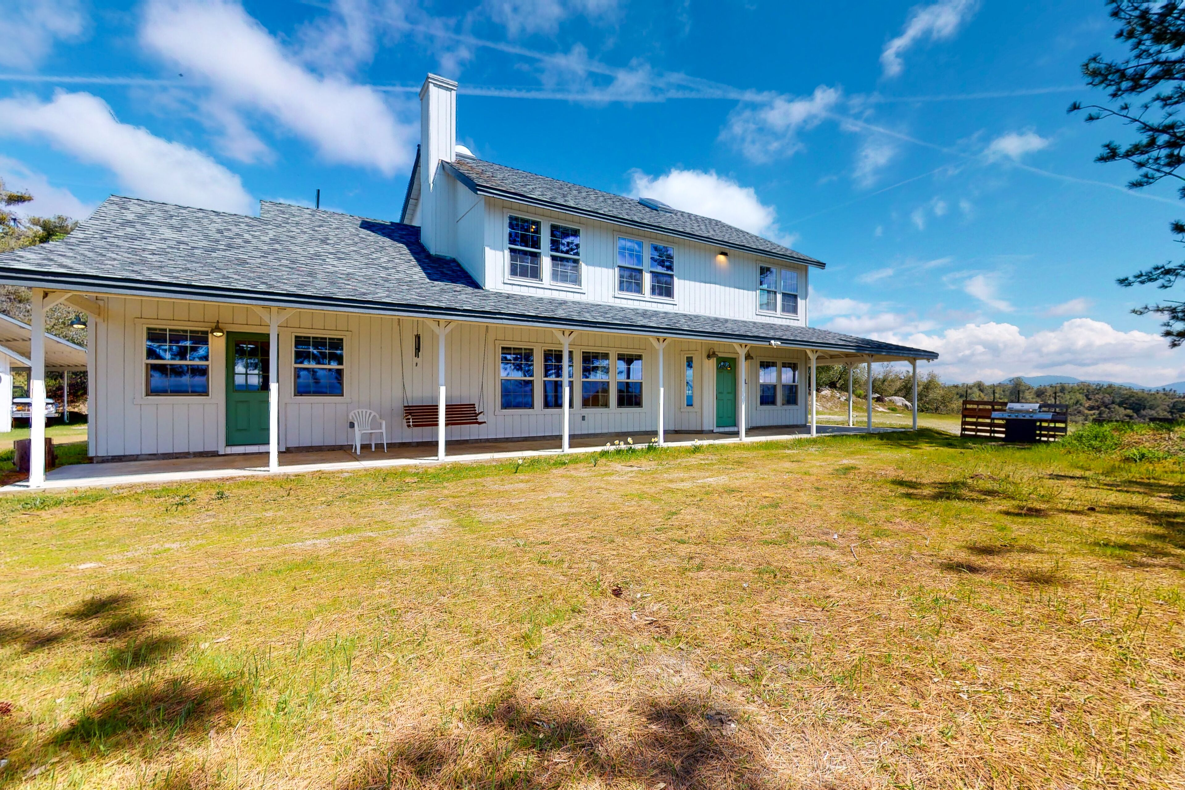 Updated mountain-view home with covered porch, central AC, & electric fireplace