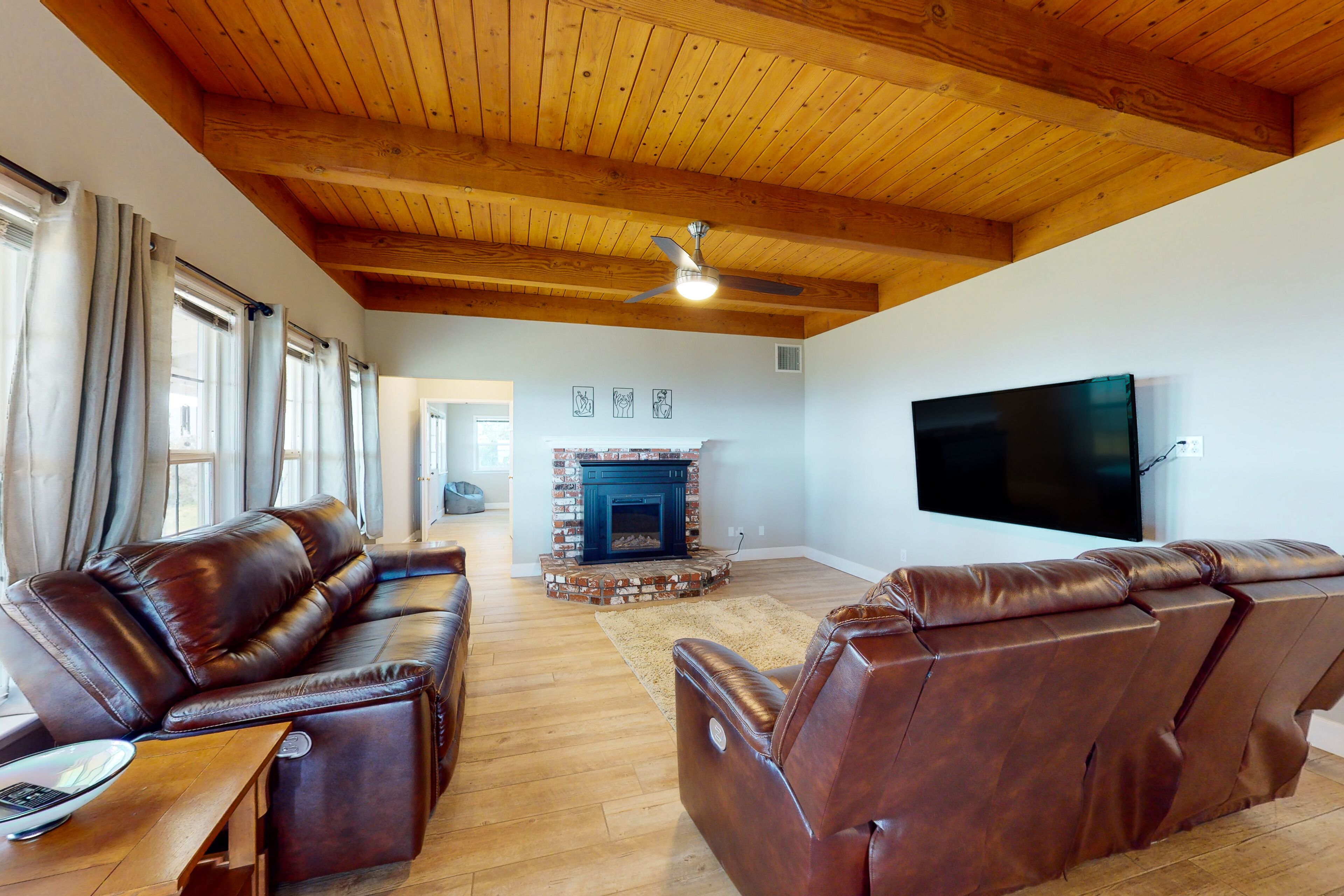 Updated mountain-view home with covered porch, central AC, & electric fireplace