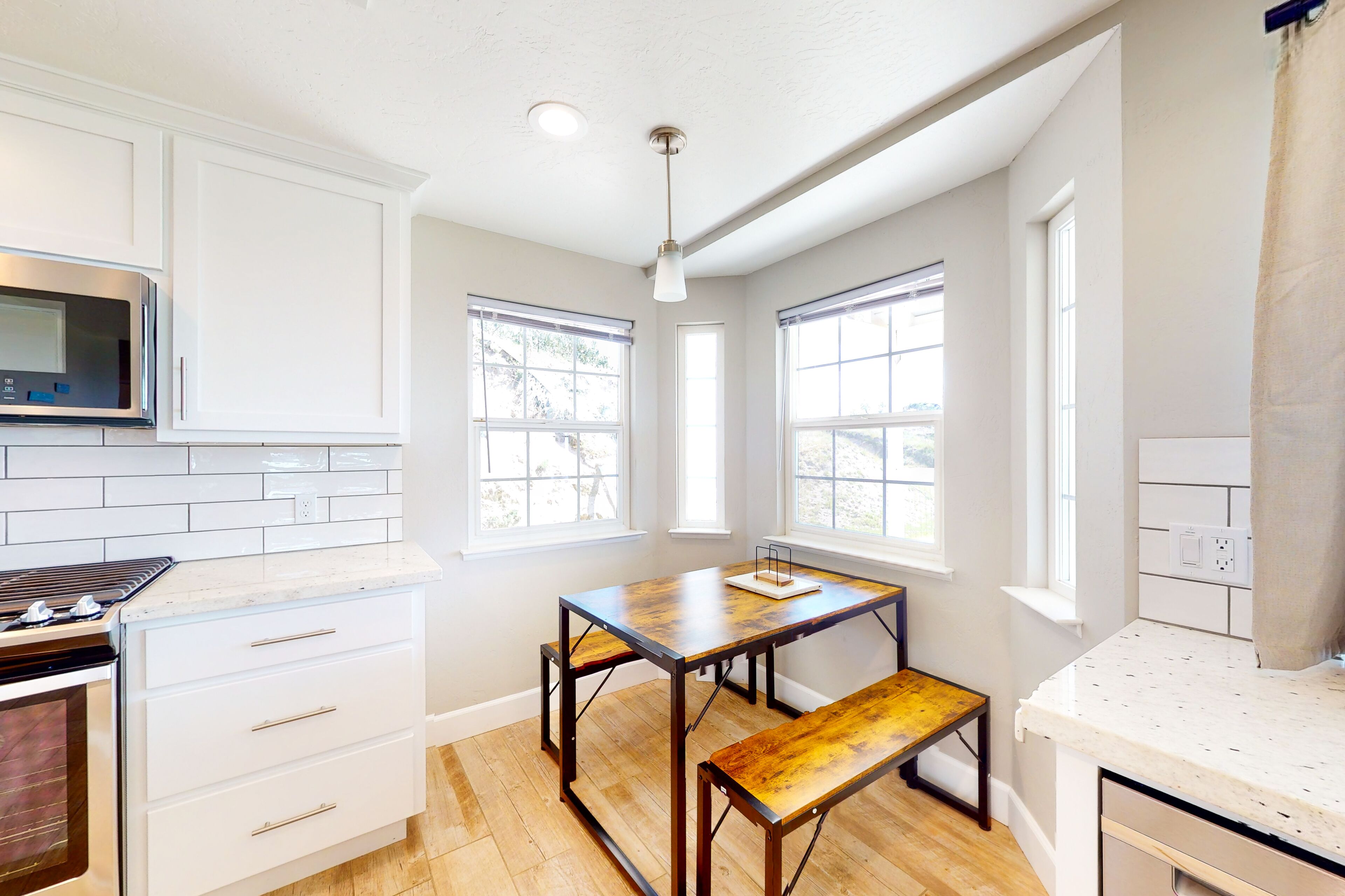 Updated mountain-view home with covered porch, central AC, & electric fireplace