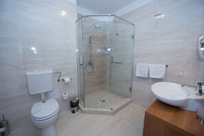 Shower, free toiletries, hair dryer, bathrobes