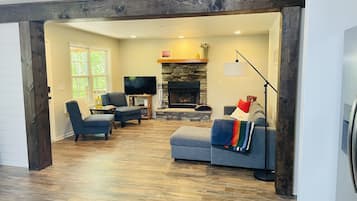 Smart TV, fireplace, video games, foosball