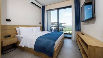Premium bedding, memory-foam beds, minibar, desk