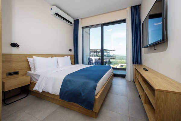 Premium bedding, memory foam beds, minibar, desk