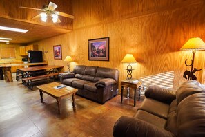 TV - Riverfront cabin with a pool! (Concan)