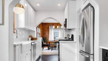 Fridge, coffee/tea maker, cookware/dishes/utensils