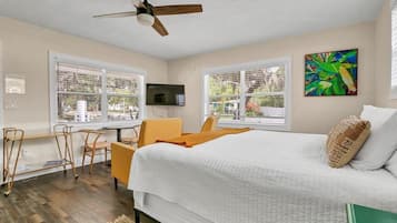 1 habitación, tabla de planchar con plancha y cuna de viaje