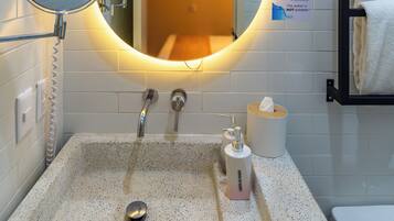 Standard Suite Queen Bed | Bathroom | Hair dryer, bathrobes, towels