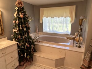 Jetted bath, towels, soap, toilet paper