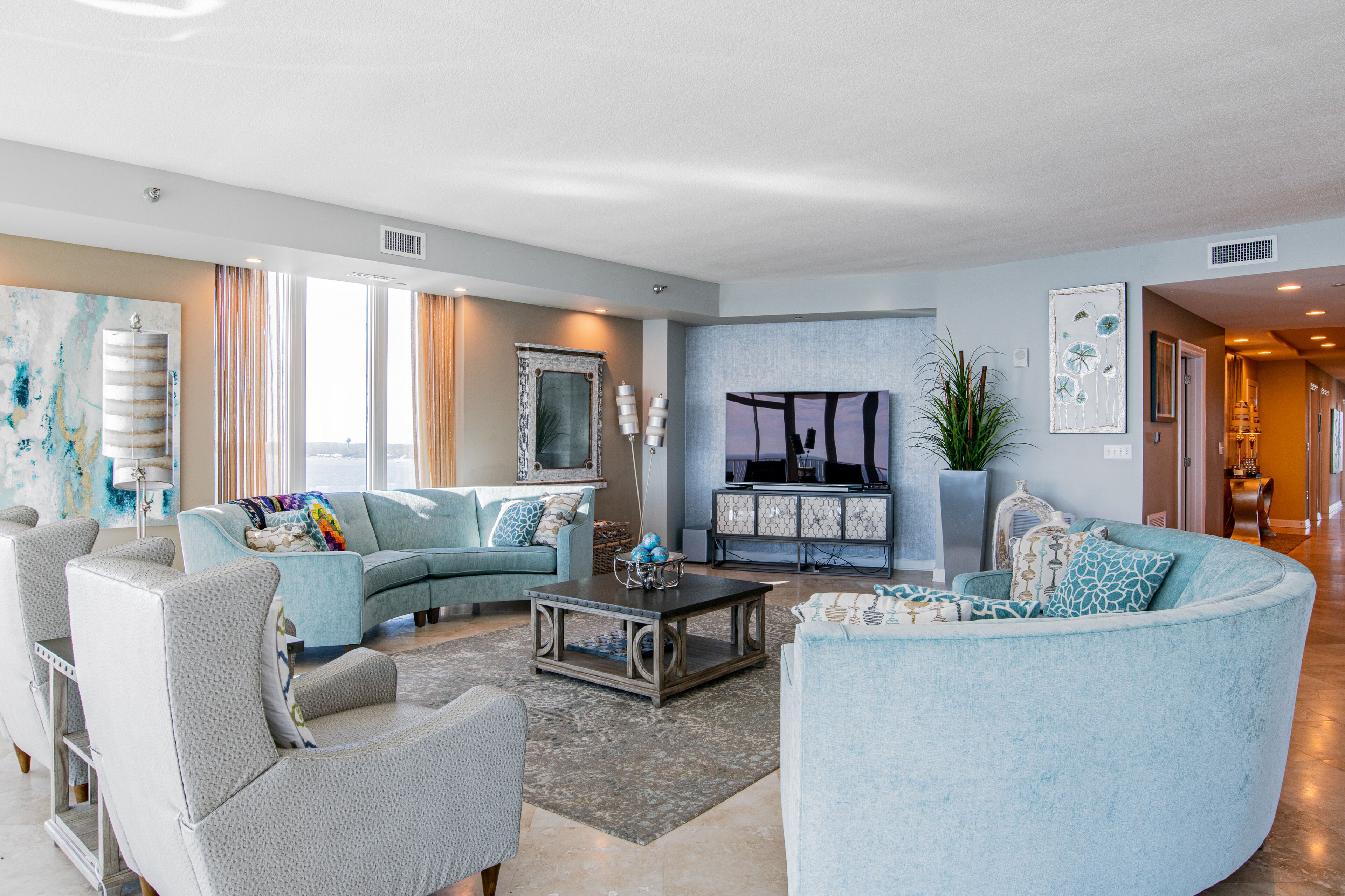 Inviting condo with beach access, balcony, pool, hot tub, & W/D