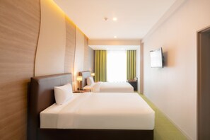 Standard-Zweibettzimmer | 1 Schlafzimmer, Daunenbettdecken, Minibar, individuell dekoriert