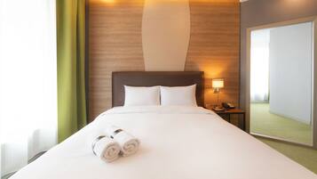 Apartamento família | 1 quarto, edredons de pluma, frigobar, individualmente decorados