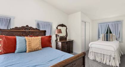 New Listing! Beautiful riverfront farm style home with amazing views and hot tub
