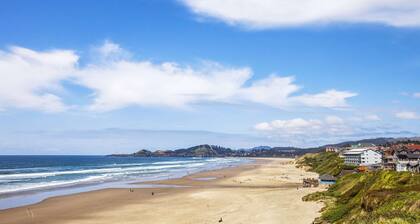 New Listing! Beautiful riverfront farm style home with amazing views and hot tub