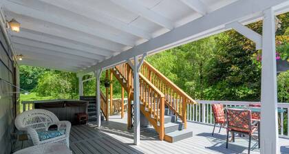 New Listing! Beautiful riverfront farm style home with amazing views and hot tub