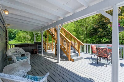 New Listing! Beautiful riverfront farm style home with amazing views and hot tub