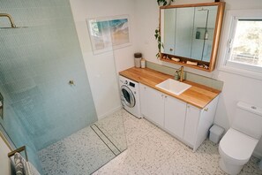 Shower, eco-friendly toiletries, hair dryer, towels