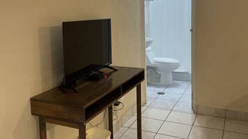 Basic Double Room | Living area | 42-inch plasma TV with digital channels, TV