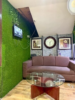 Coin salon dans le hall