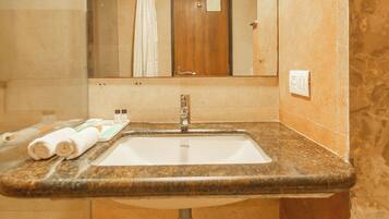 Shower, free toiletries, hair dryer, towels