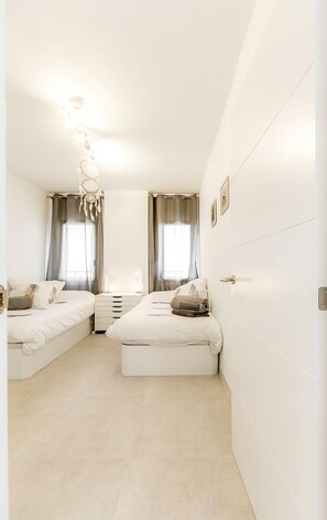 2 dormitorios, caja fuerte, tabla de planchar con plancha y wifi gratis