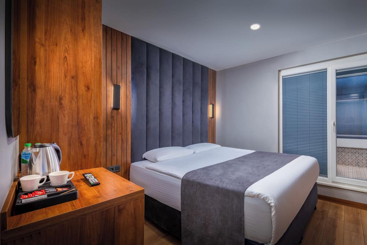 Standard-Doppel- oder -Zweibettzimmer | BettwÀsche aus Àgyptischer Baumwolle, hochwertige Bettwaren, Minibar
