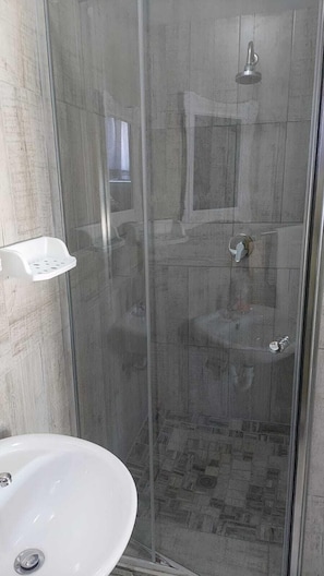 Rainfall showerhead, designer toiletries, hair dryer, bathrobes