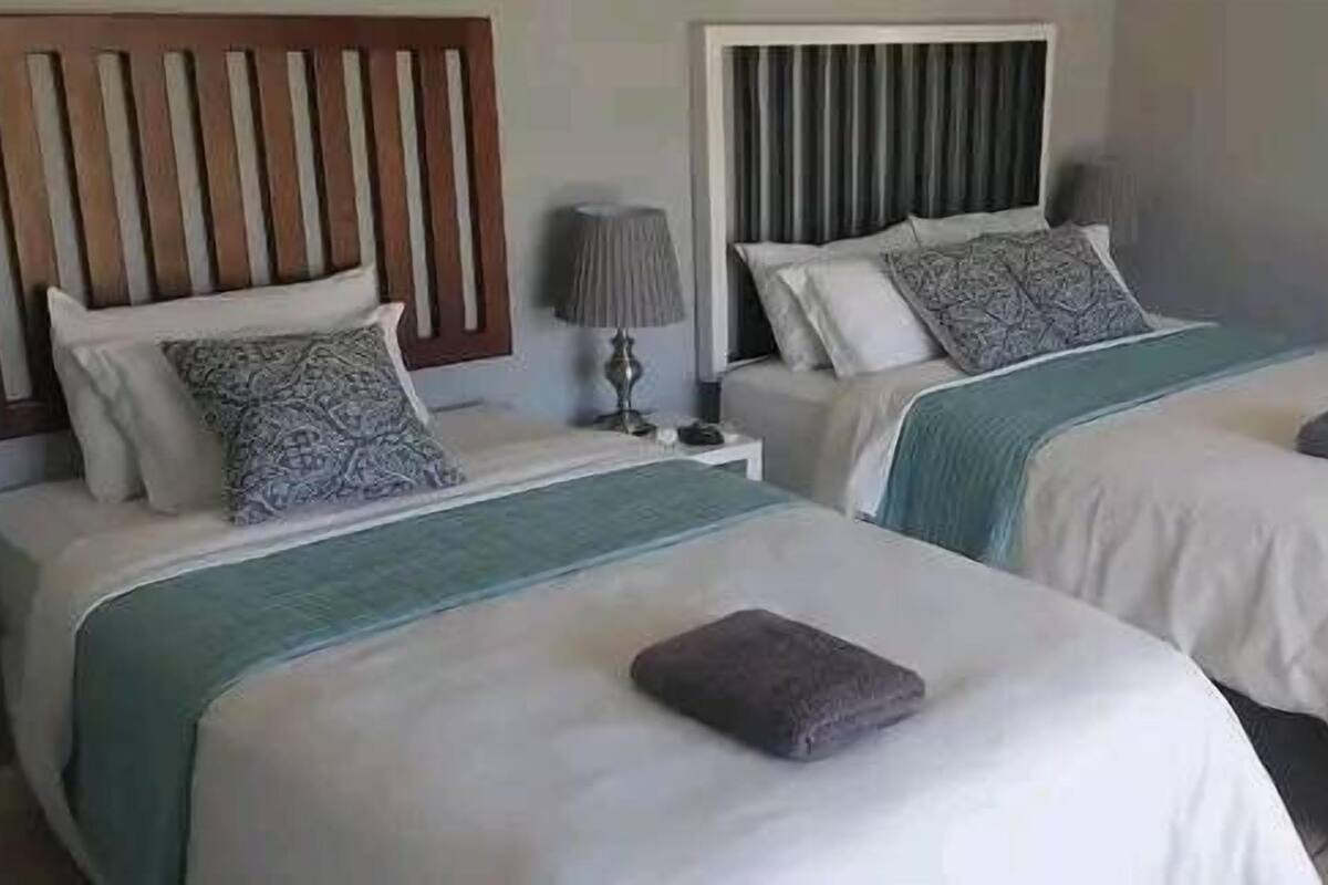 Hypo-allergenic bedding, down duvets, minibar, desk