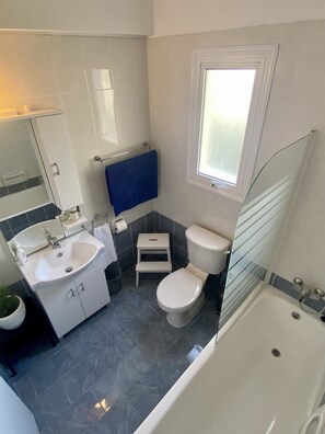 Hair dryer, towels, soap, shampoo