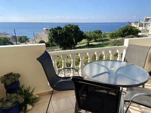 Outdoor dining - Stunning Sea View Apartment in the Sea Caves (Peyia)