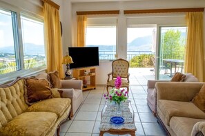 TV, fireplace, video library - Villa Afroditi near Airport with Pool, Free Wi Fi, Souda Bay Views, Garden Oasis (Chania)