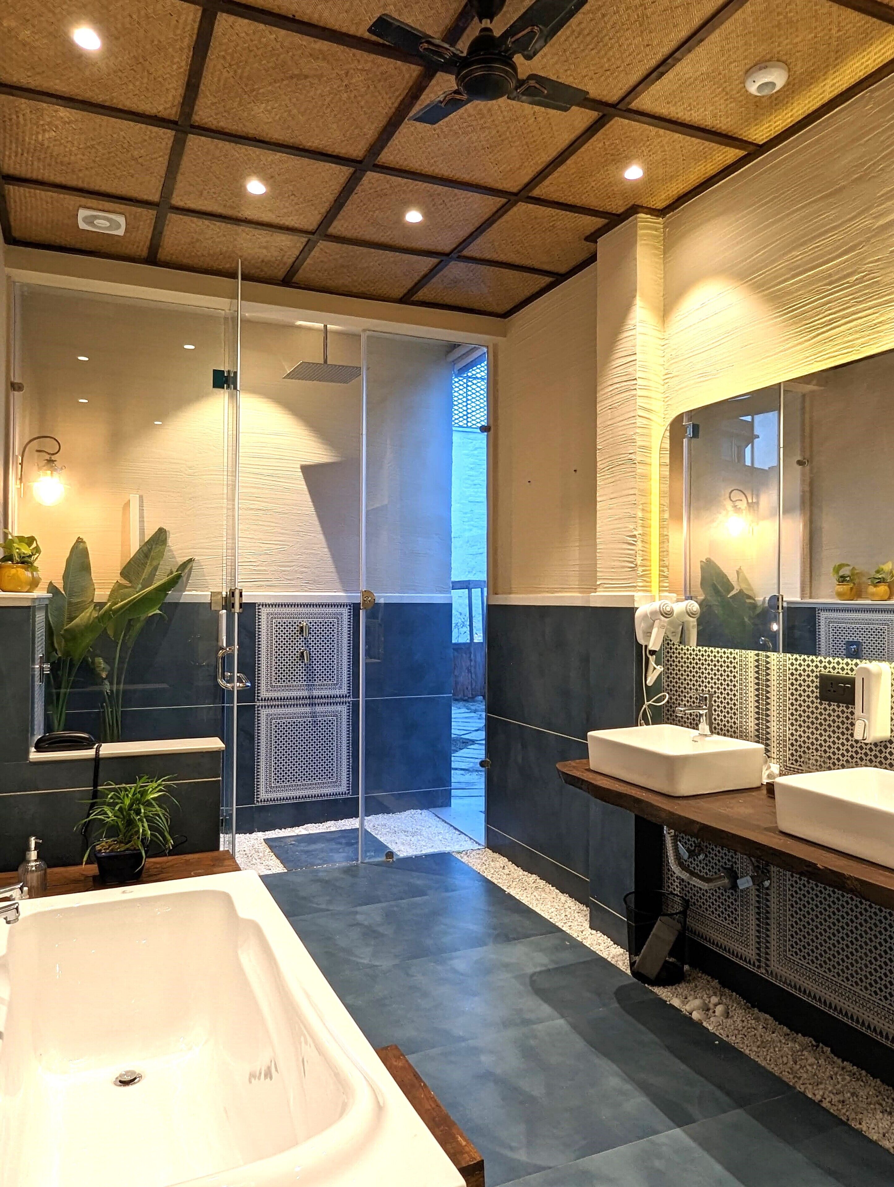 presidential studio suite | bathroom | separate bathtub and shower, rainfall showerhead, free toiletries