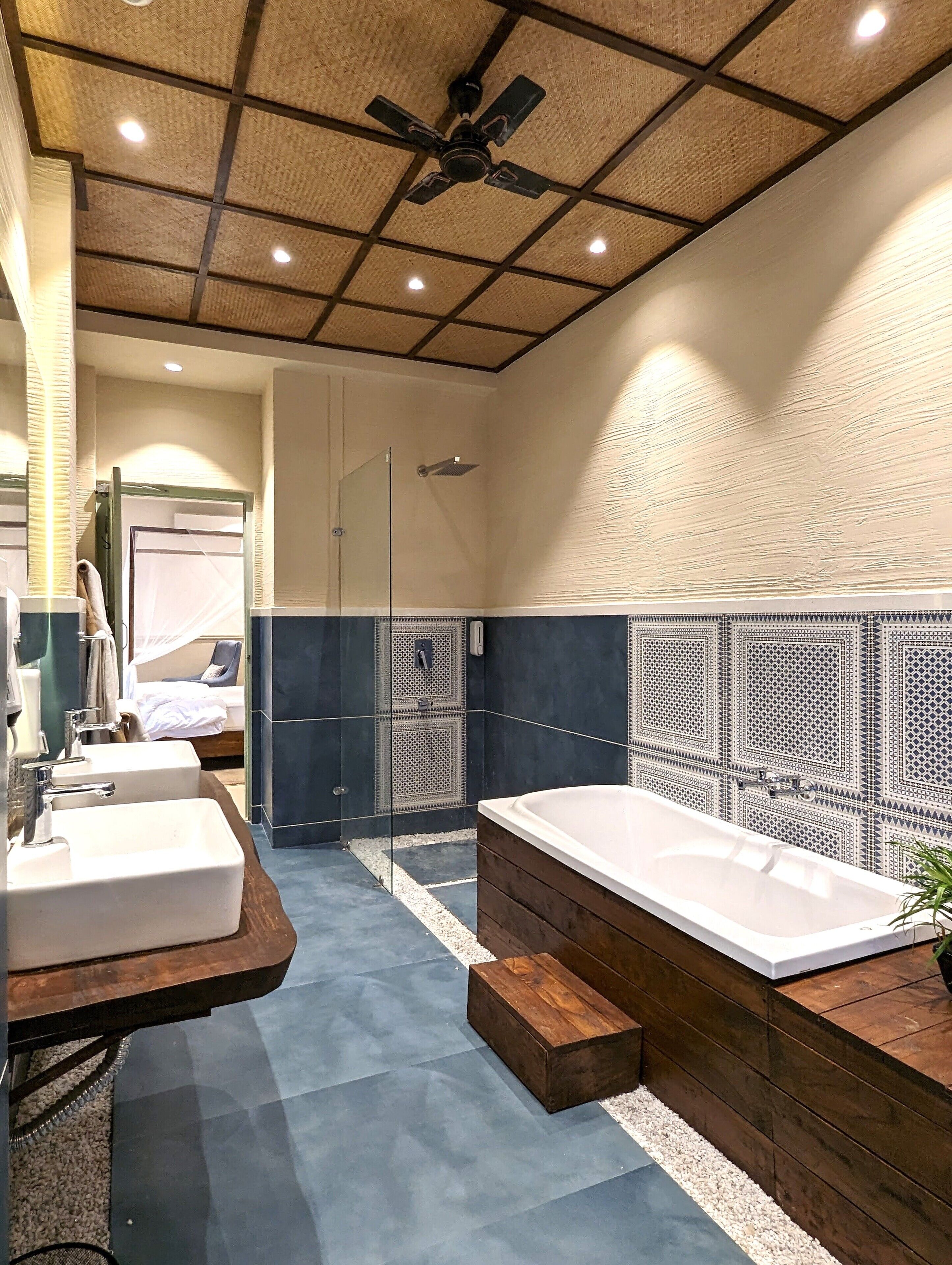 presidential studio suite | bathroom | separate bathtub and shower, rainfall showerhead, free toiletries