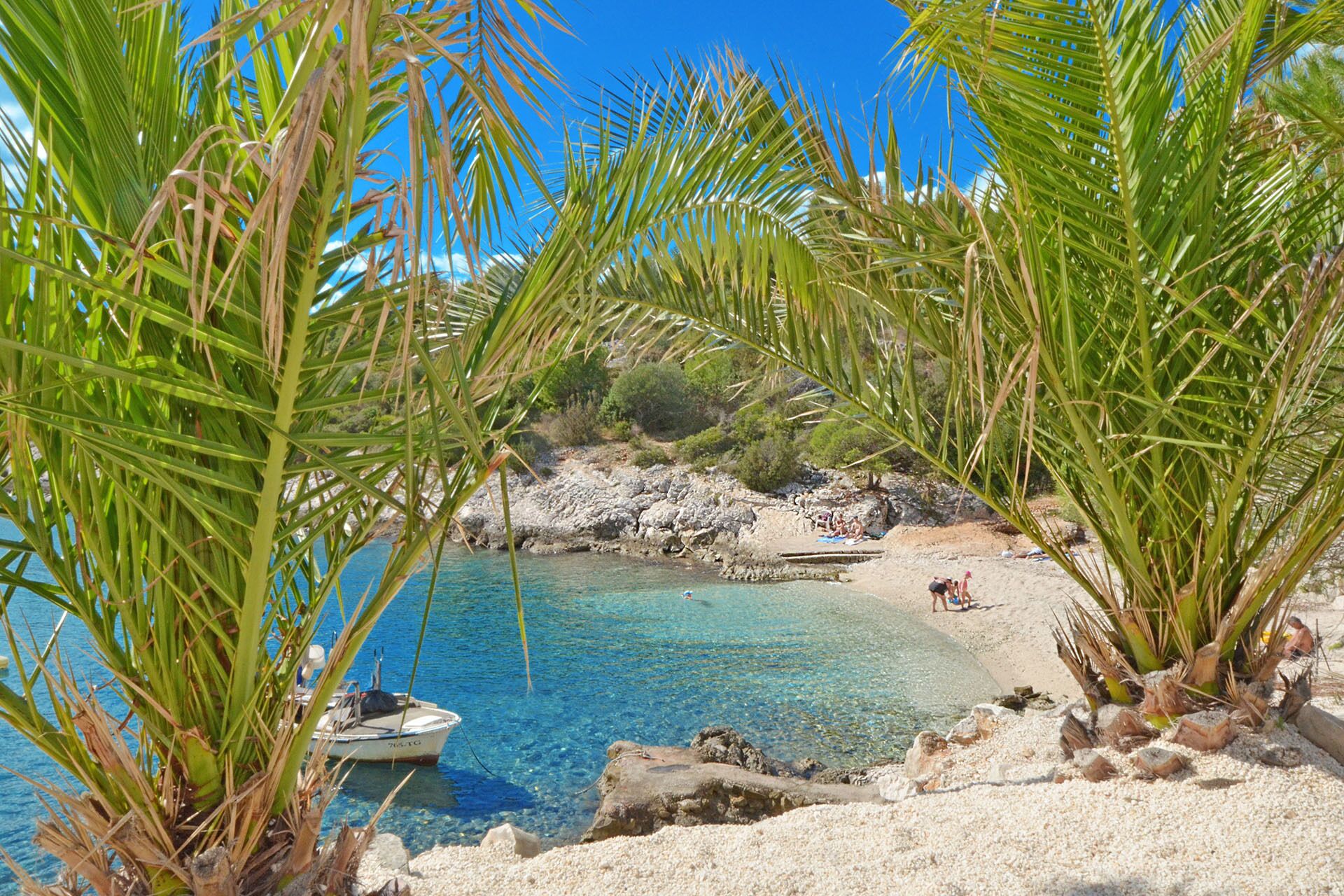 På stranden og solsenger
