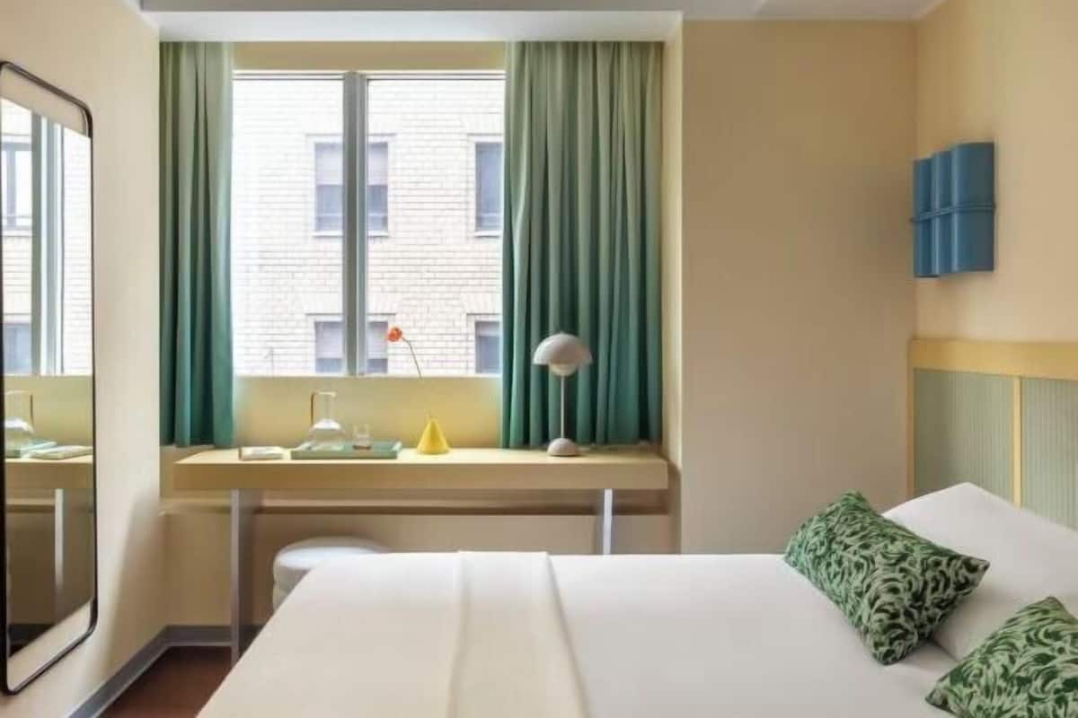 Hypo-allergenic bedding, down comforters, minibar, in-room safe