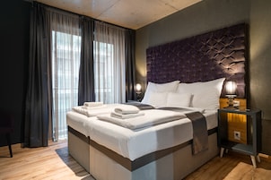 Suite Premium | Sábanas italianas Frette y ropa de cama de alta calidad