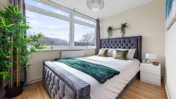 Apartamento, varias camas | 4 dormitorios, tabla de planchar con plancha, wifi gratis y ropa de cama