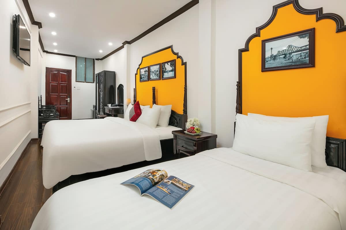 Family Room | Pillowtop beds, minibar, desk, soundproofing
