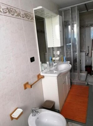 Hair dryer, towels, soap, shampoo