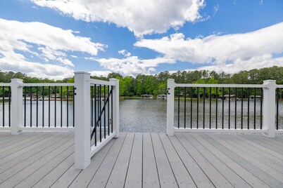 Spacious 6BR Lakefront Home: Pet-Friendly, Dock, Firepit, Ping-Pong