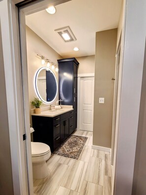 Hair dryer, towels, soap, toilet paper