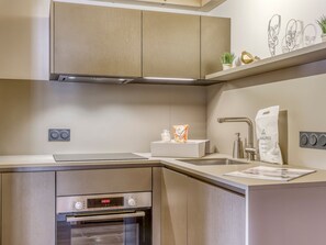 Fridge, oven, dining tables