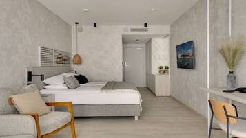 Un dormitorio moderno con una cama, un escritorio y una silla.