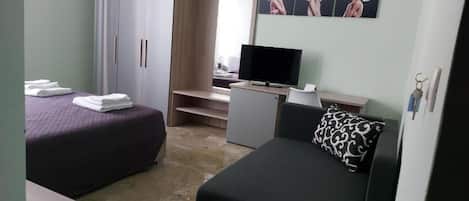 Triple Room, City View | 2 bedrooms, premium bedding, down duvets, memory-foam beds