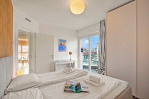 Appartement Standard, plusieurs chambres (Attico Al Parco with airconditioning) | 1 chambre, fer et planche à repasser, Wi-Fi gratuit, draps fournis