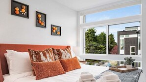 2 bedrooms, desk, blackout curtains, iron/ironing board